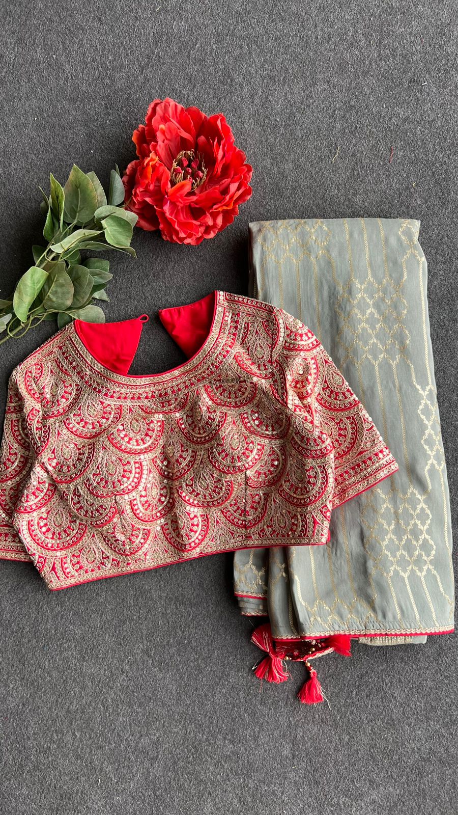 Grey silk saree with red heavy embroidery work blouse