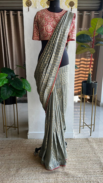 Grey silk saree with red heavy embroidery work blouse