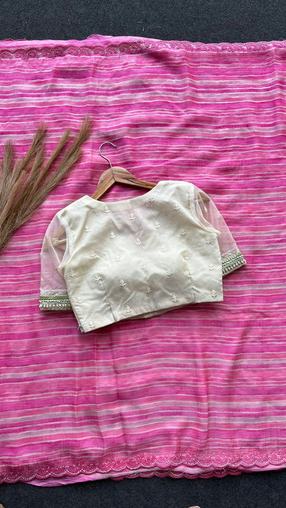 Pink chiffon stripped saree with cream hand work blouse