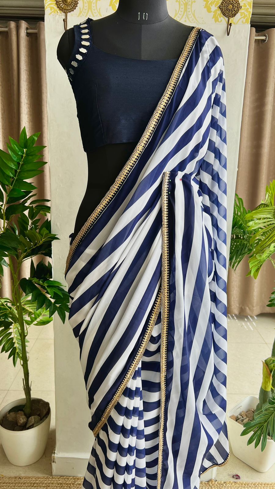 White & blue stripped georgette saree with blue original mirror work blouse