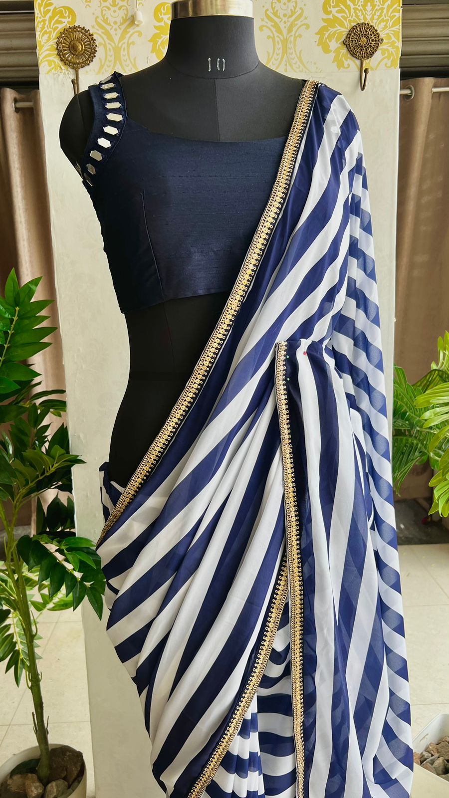 White & blue stripped georgette saree with blue original mirror work blouse