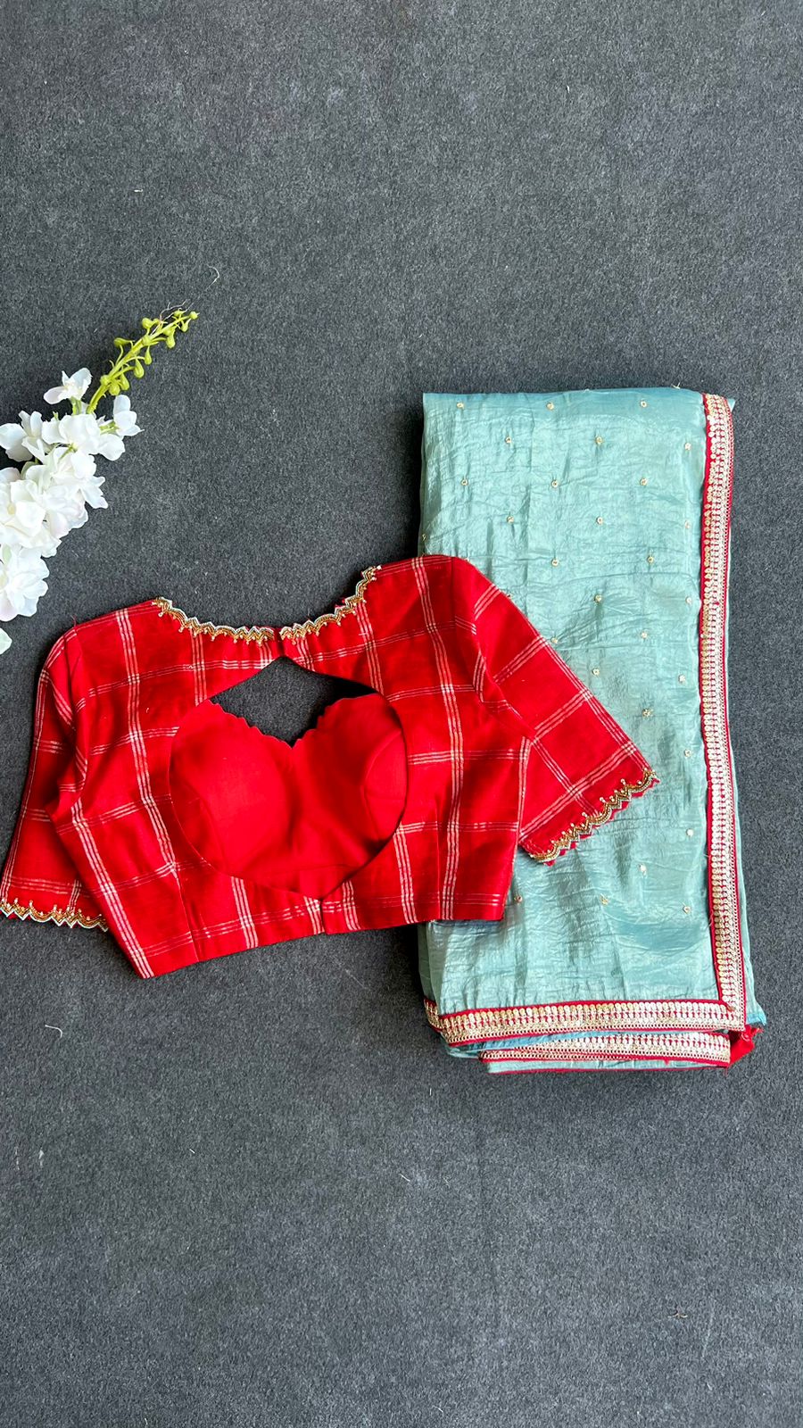 Blue glass tissue saree with red tussar silk hand work blouse