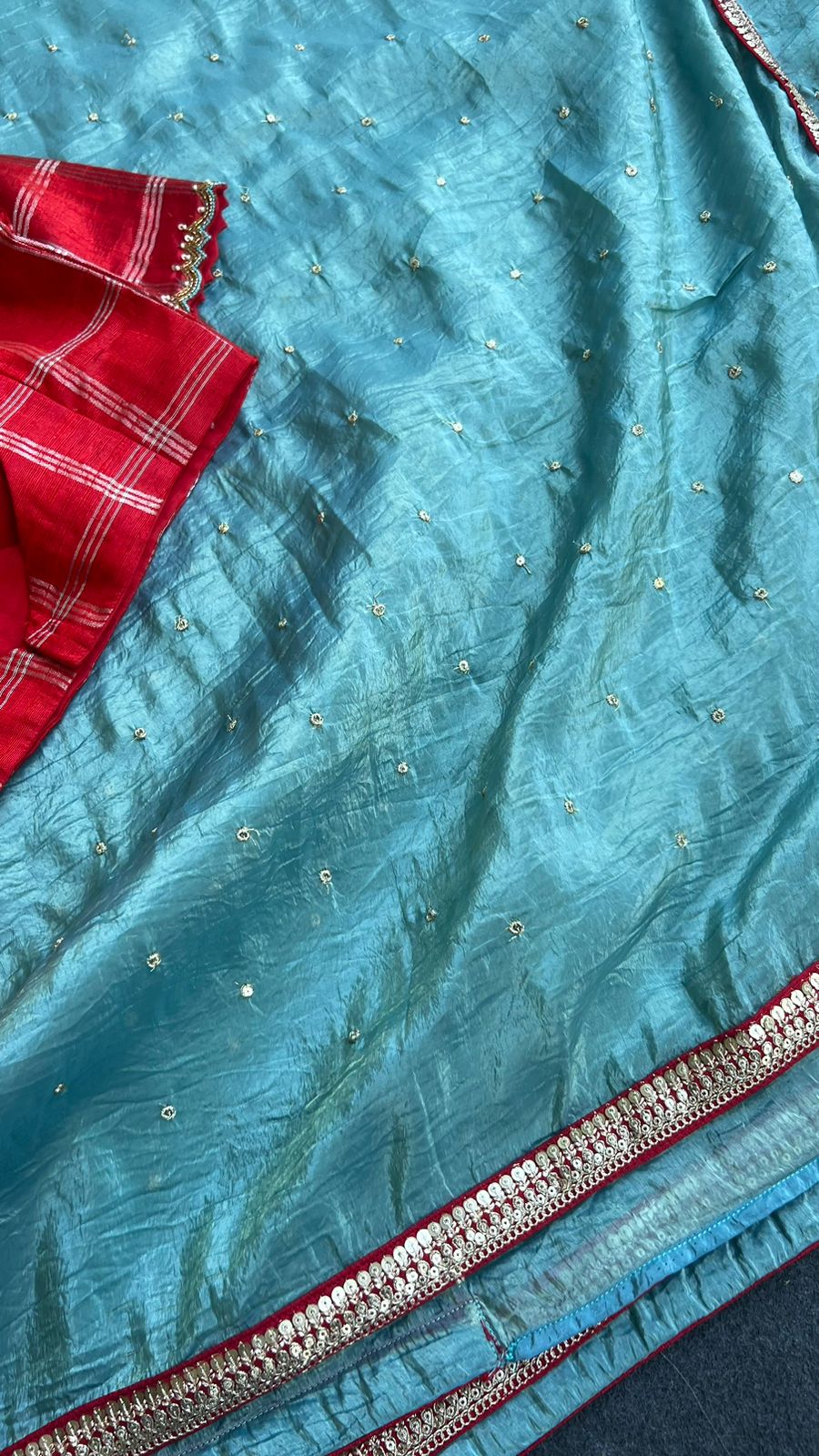 Blue glass tissue saree with red tussar silk hand work blouse