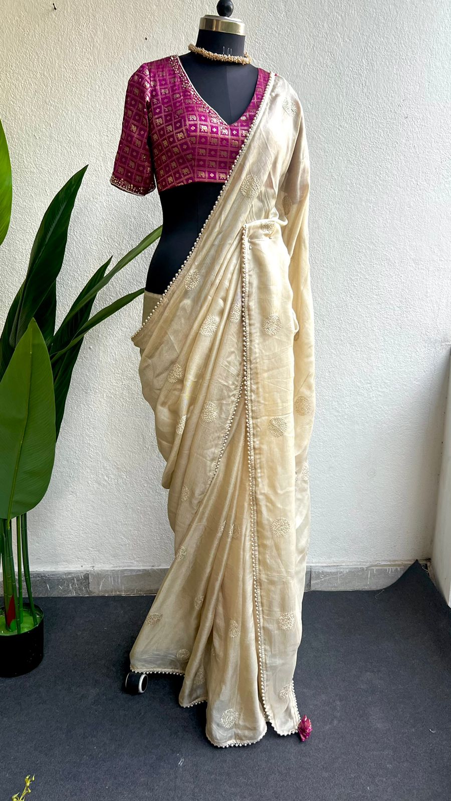 Cream soft jute saree with pink banarasi hand work blouse