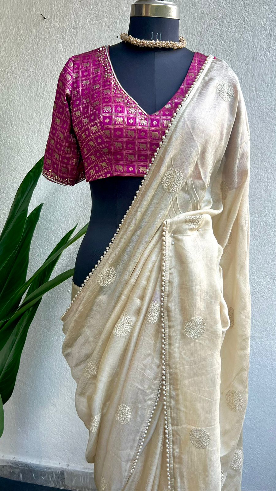 Cream soft jute saree with pink banarasi hand work blouse