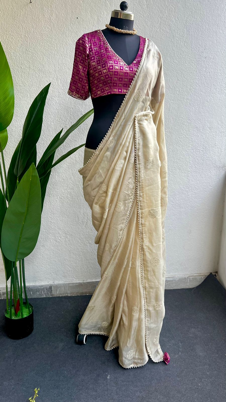 Cream soft jute saree with pink banarasi hand work blouse