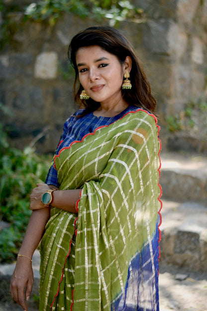 Green checked chiffon saree with blue silk hand work blouse