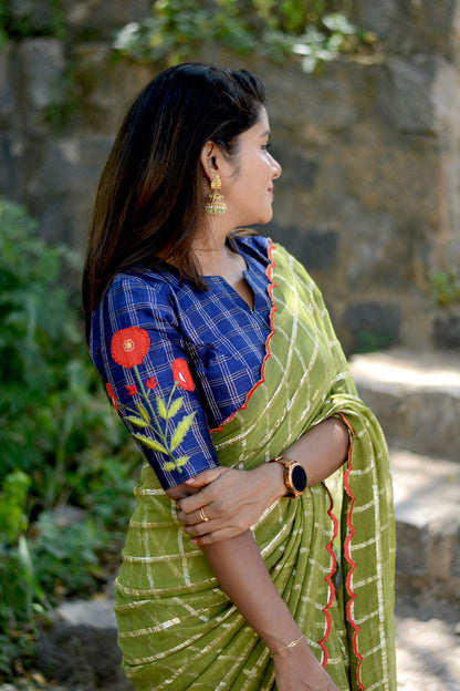 Green checked chiffon saree with blue silk hand work blouse