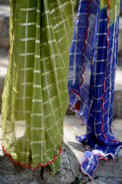 Green checked chiffon saree with blue silk hand work blouse