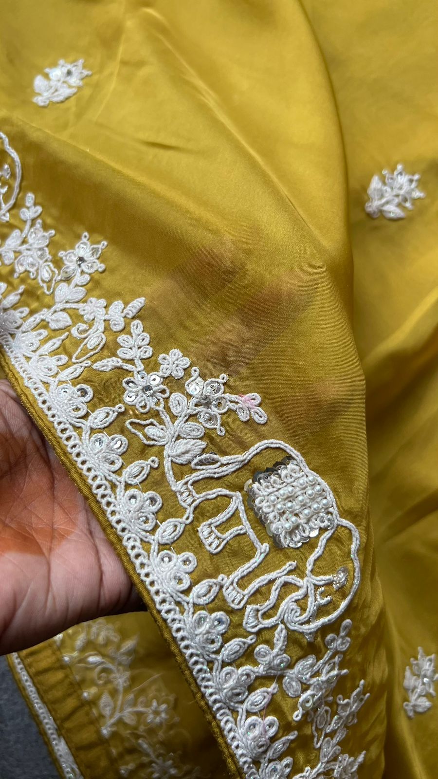 Fenugreek yellow soft organza saree with pink floral embroidery blouse