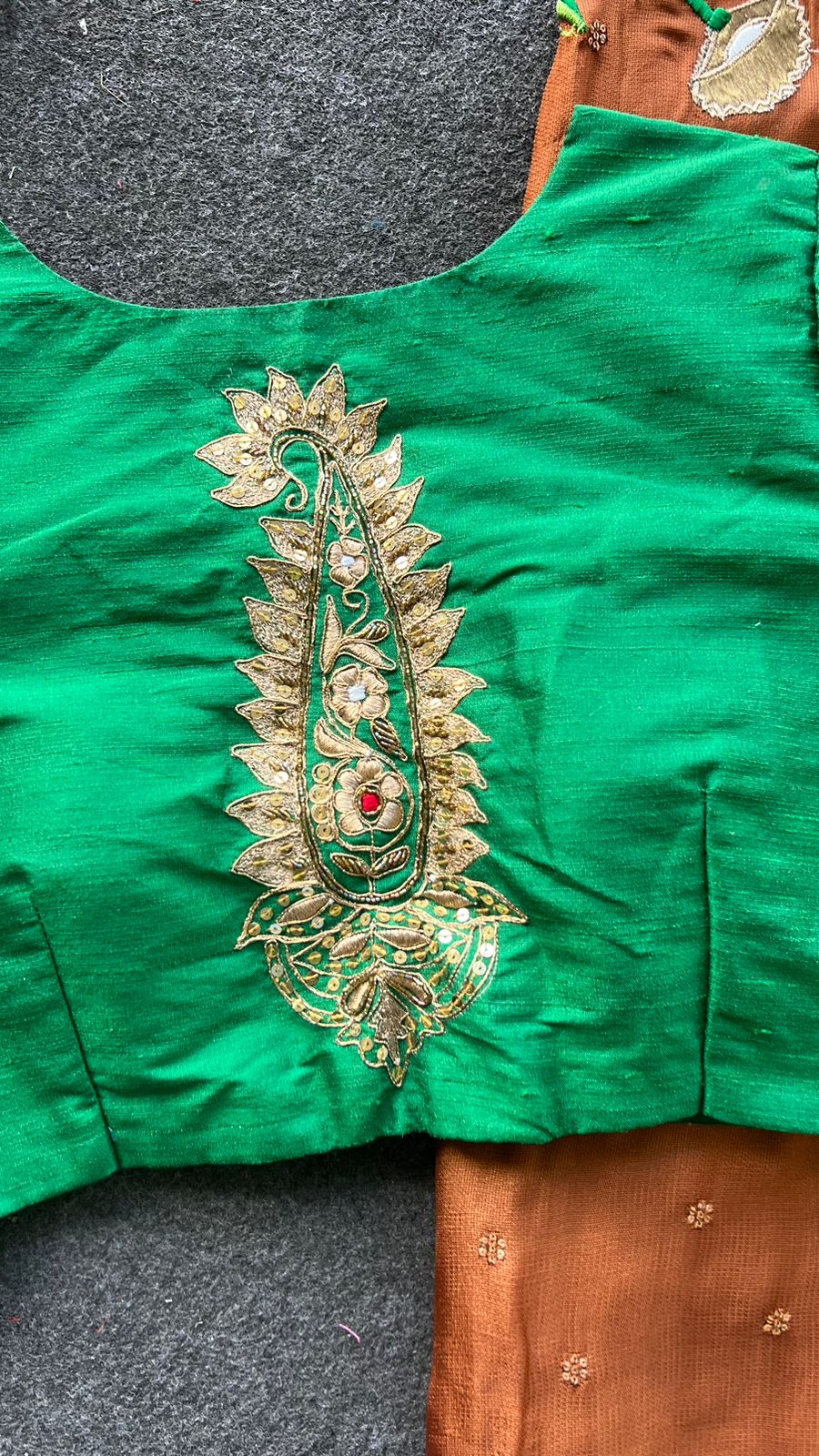 Honey jute saree with green hand worked paisley blouse