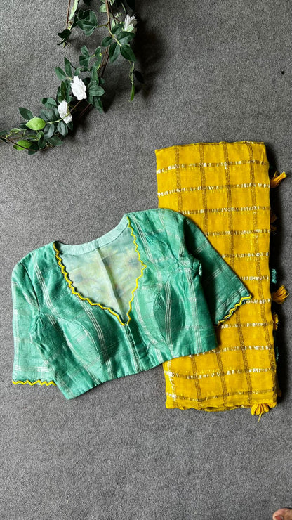 Yellow chiffon saree with green pure jute hand worked blouse