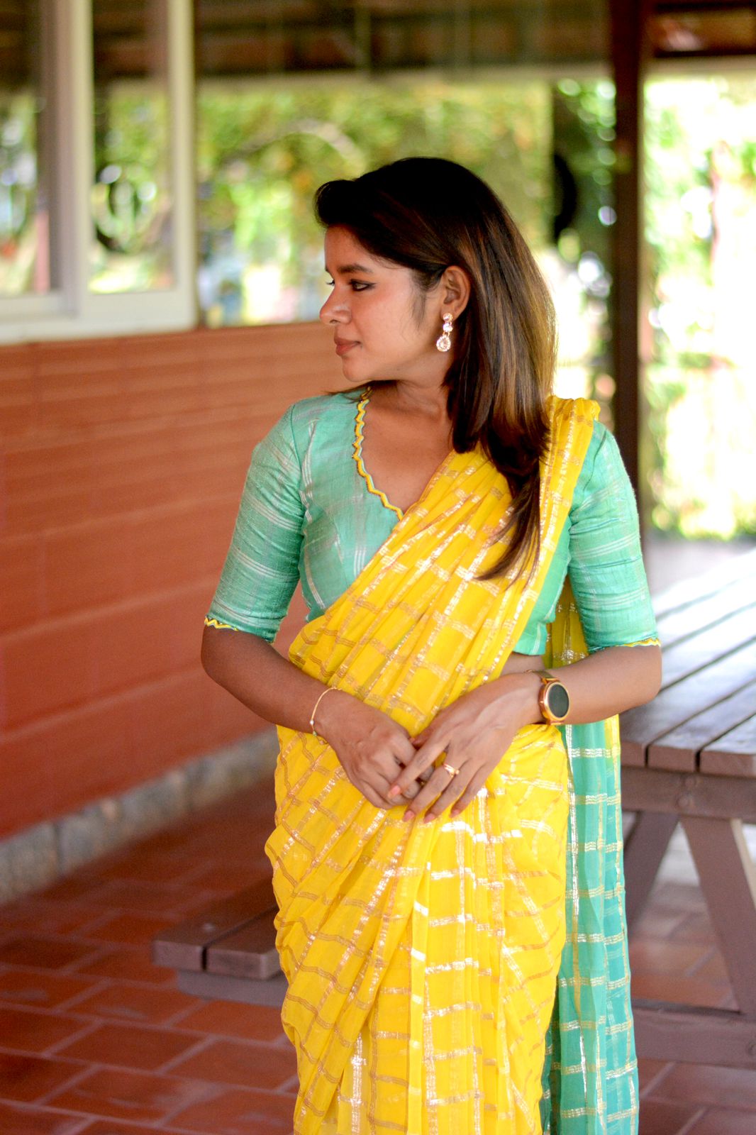 Yellow chiffon saree with green pure jute hand worked blouse