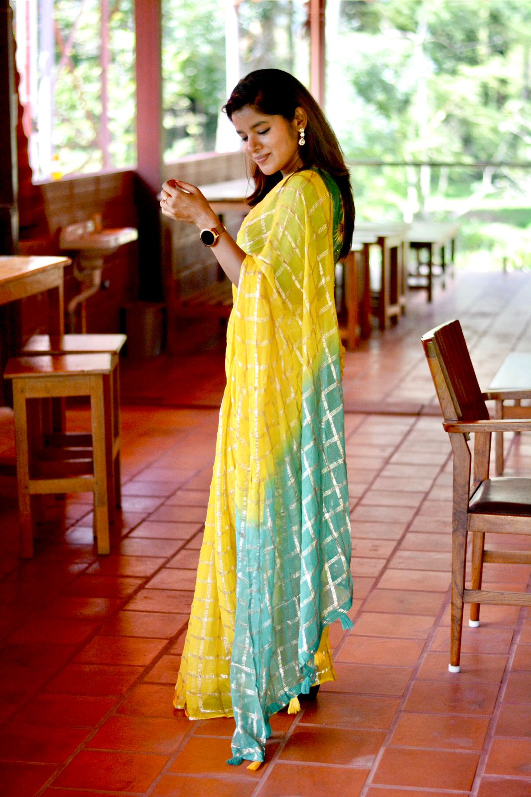 Yellow chiffon saree with green pure jute hand worked blouse