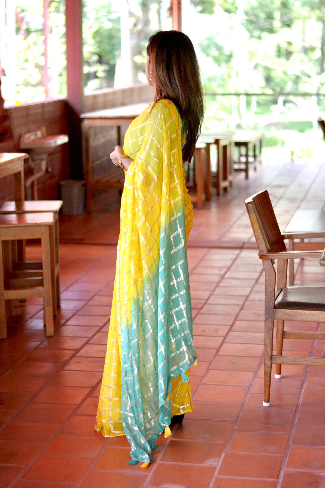 Yellow chiffon saree with green pure jute hand worked blouse