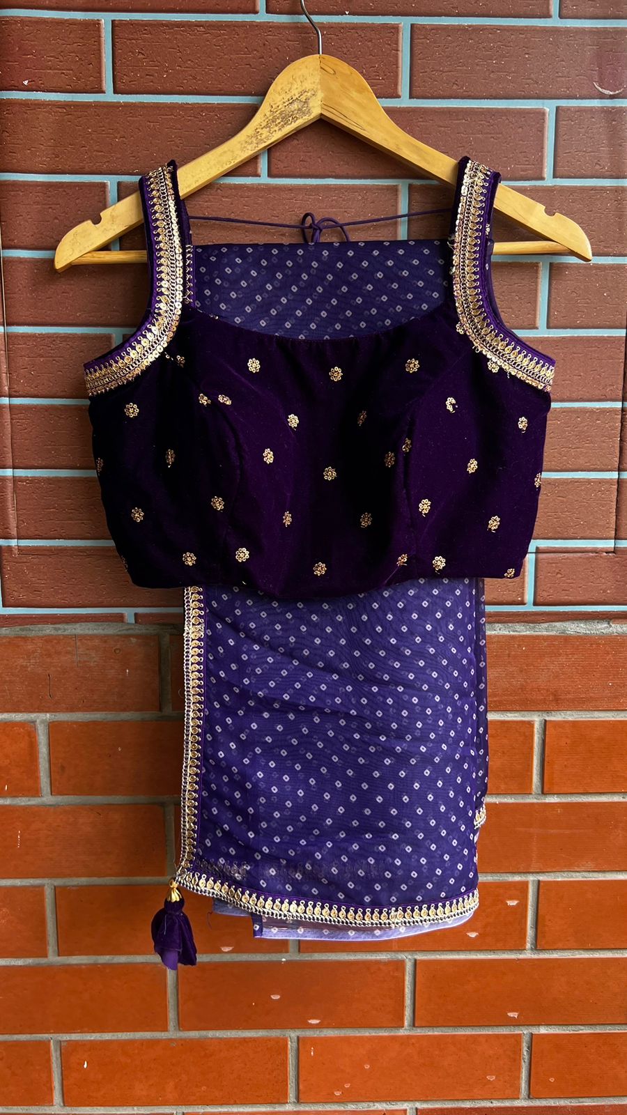 purple organza saree with purple velvet embroidered blouse