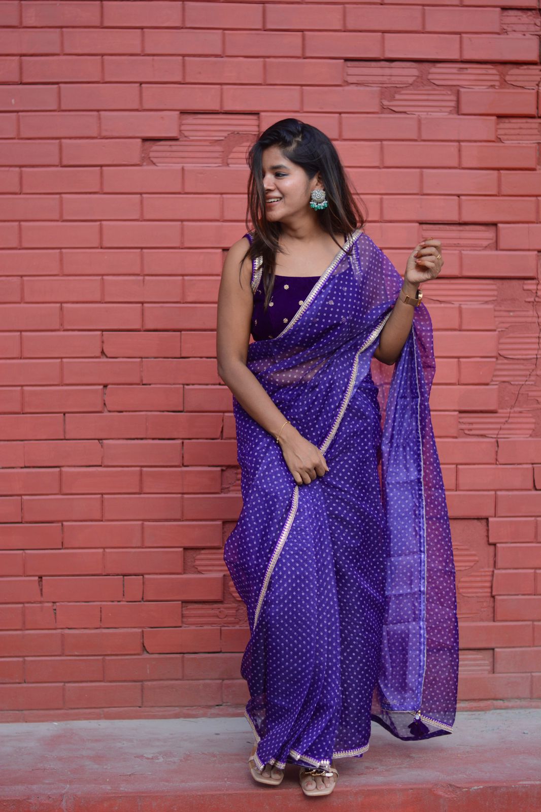 purple organza saree with purple velvet embroidered blouse