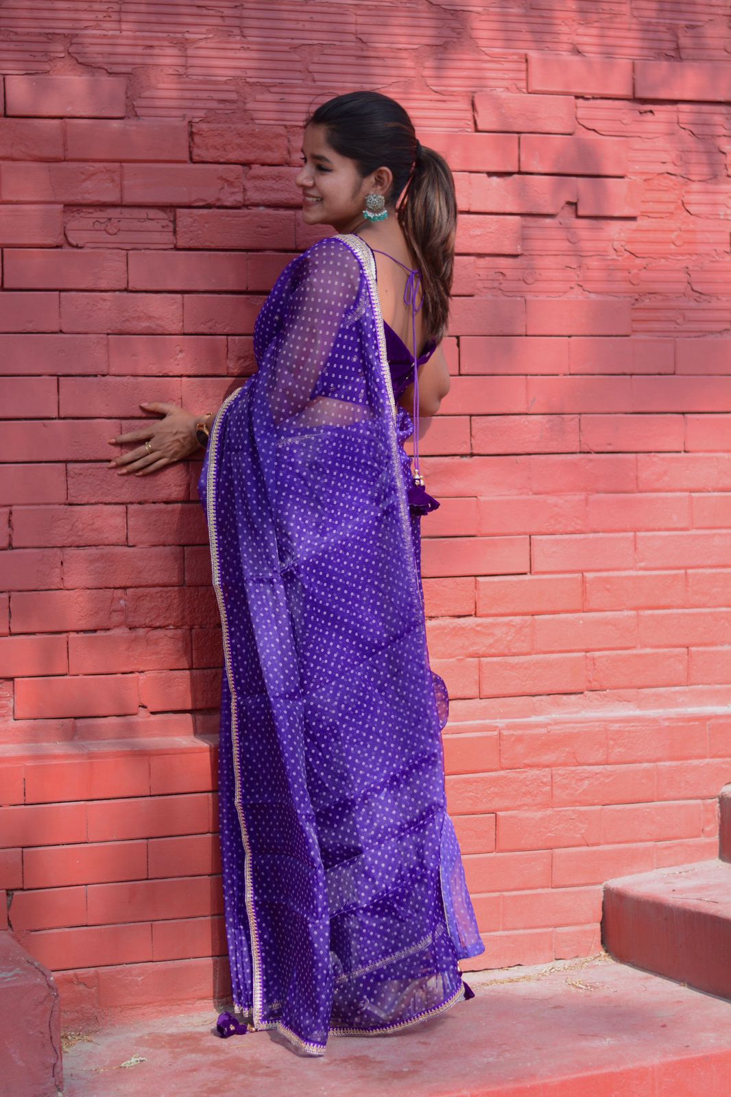 purple organza saree with purple velvet embroidered blouse