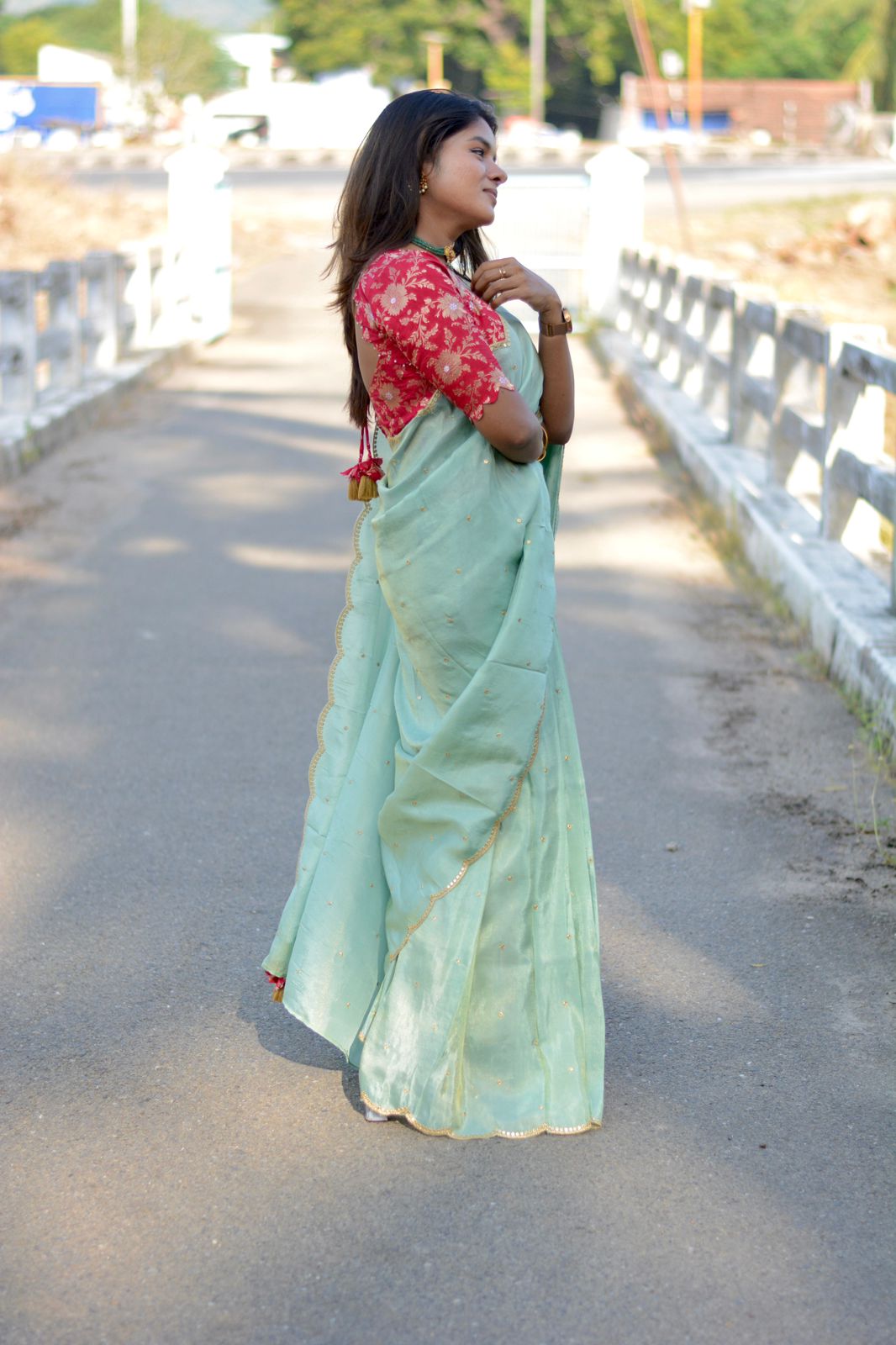 Sea blue tissue saree with red banarasi hand worked blouse