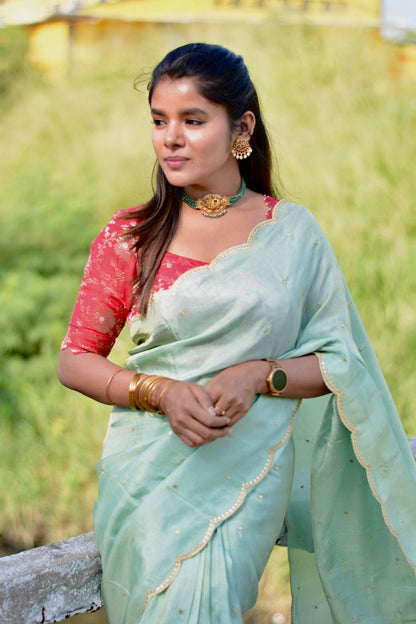 Sea blue tissue saree with red banarasi hand worked blouse