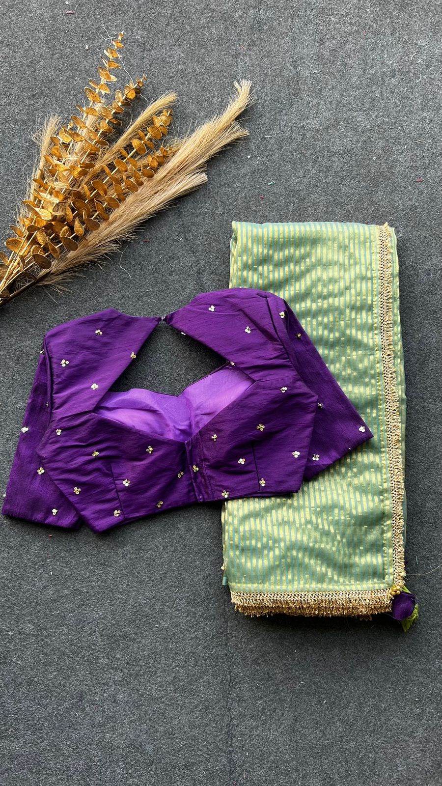 Pista green stripped tissue saree with purple hand worked blouse