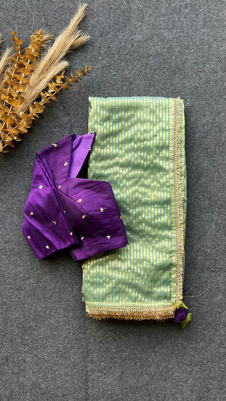 Pista green stripped tissue saree with purple hand worked blouse