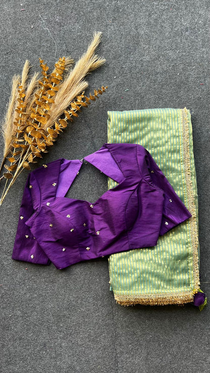 Pista green stripped tissue saree with purple hand worked blouse