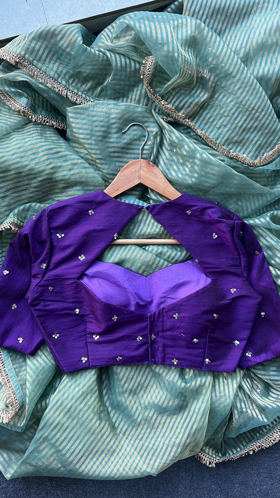 Pista green stripped tissue saree with purple hand worked blouse