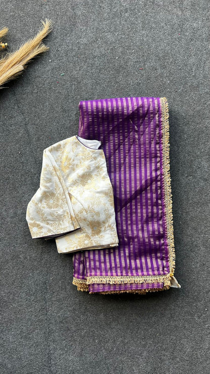 Purple stripped tissue saree with cream silk banarasi blouse