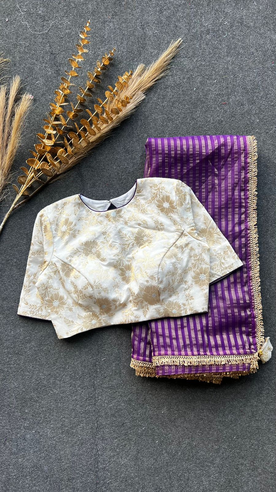 Purple stripped tissue saree with cream silk banarasi blouse