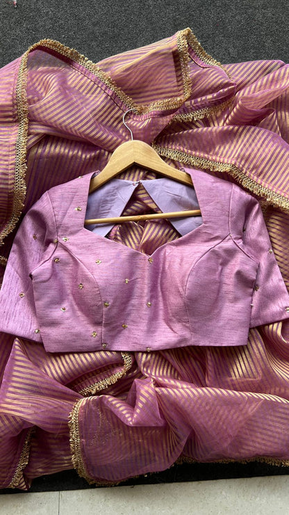 Onion pink stripped tissue saree with hand worked blouse