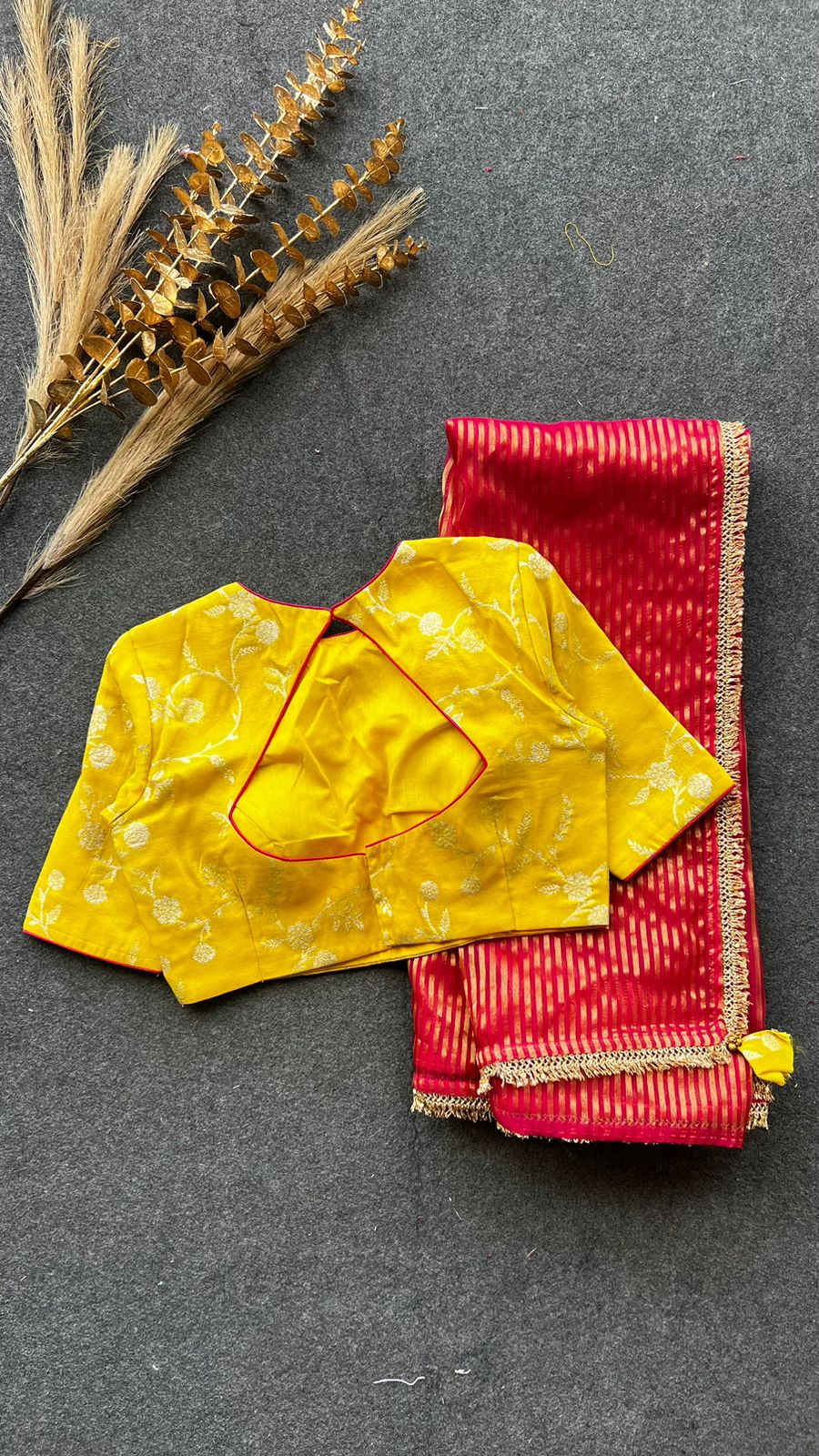 Red stripped tissue saree with yellow silk banarasi blouse