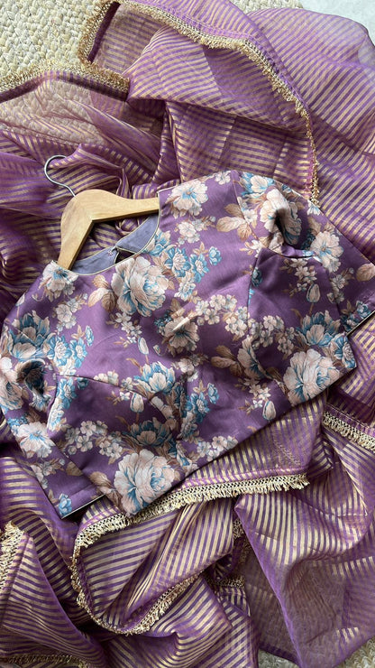 Wine stripped tissue saree with wine silk floral blouse