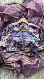 Wine stripped tissue saree with wine silk floral blouse