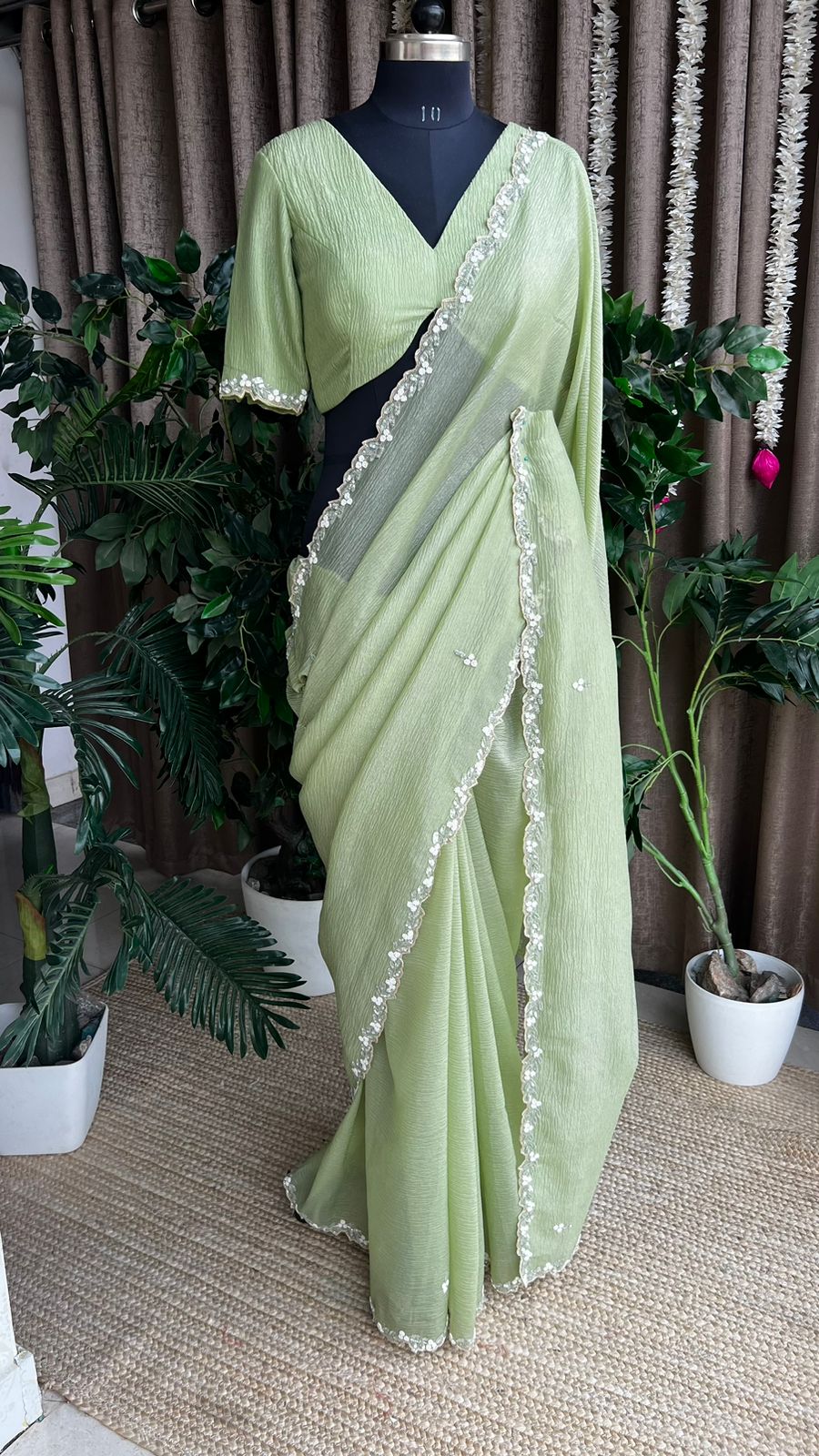 Green crushed tissue saree with hand worked blouse