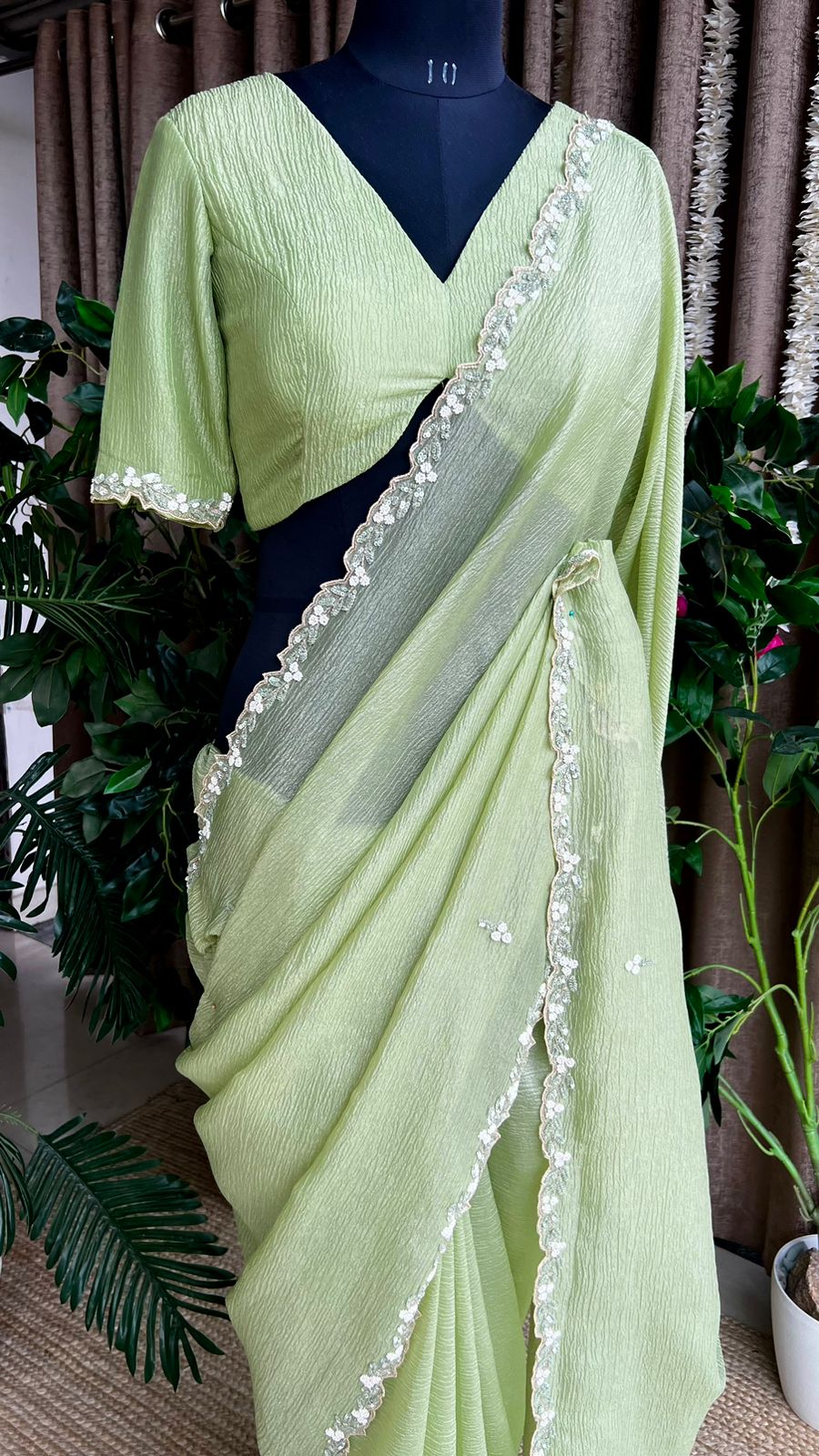 Green crushed tissue saree with hand worked blouse