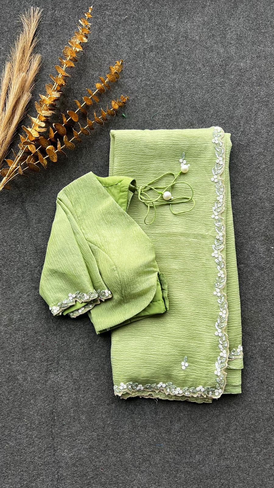 Green crushed tissue saree with hand worked blouse