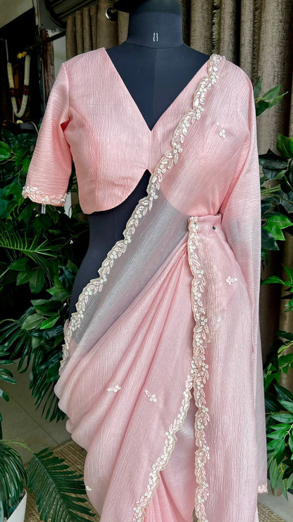 Pink crushed tissue saree with hand worked blouse