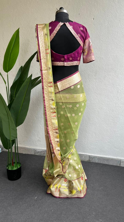 Mint green kota silk saree with purple blouse