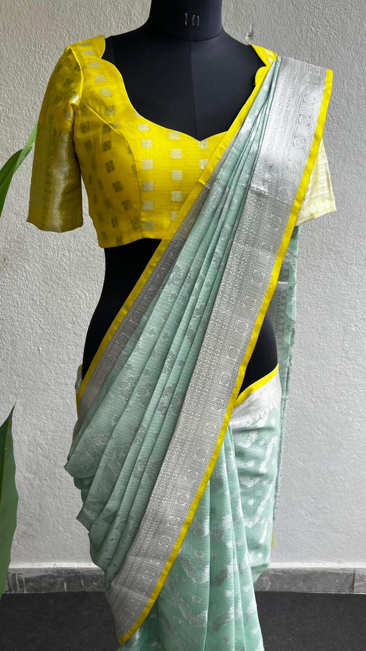 Sea green kota silk saree with yellow blouse