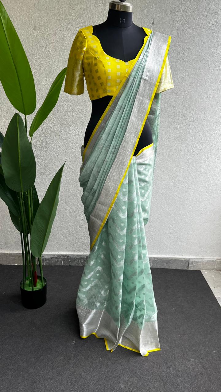 Sea green kota silk saree with yellow blouse