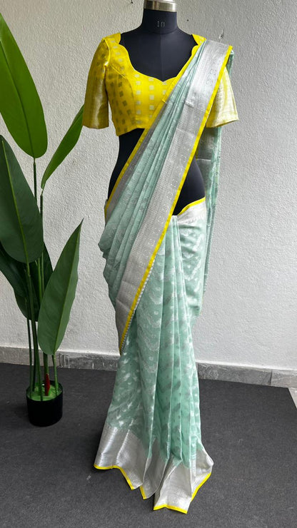 Sea green kota silk saree with yellow blouse