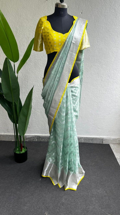 Sea green kota silk saree with yellow blouse