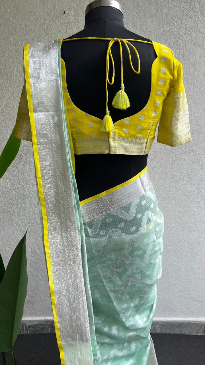 Sea green kota silk saree with yellow blouse