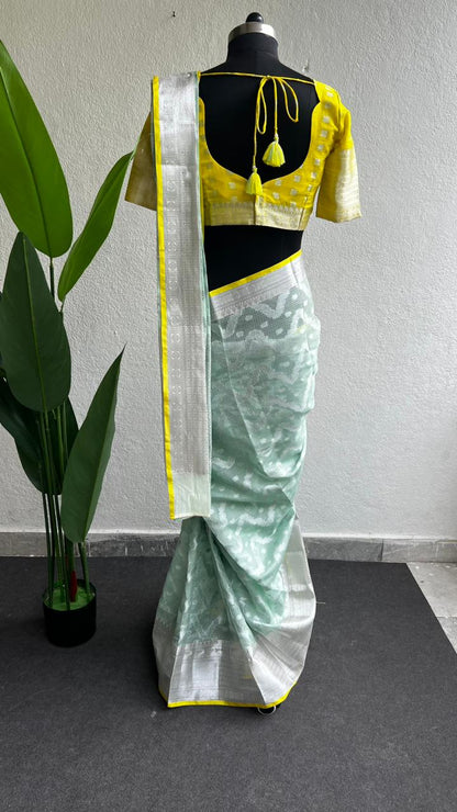 Sea green kota silk saree with yellow blouse