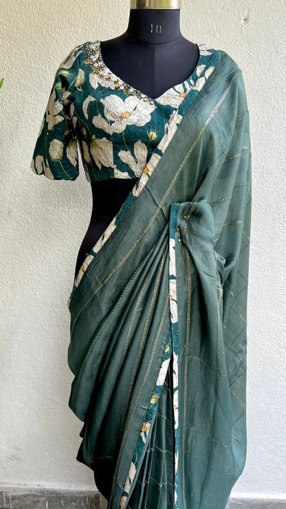 Teal green jute saree with hakoba hand worked blouse