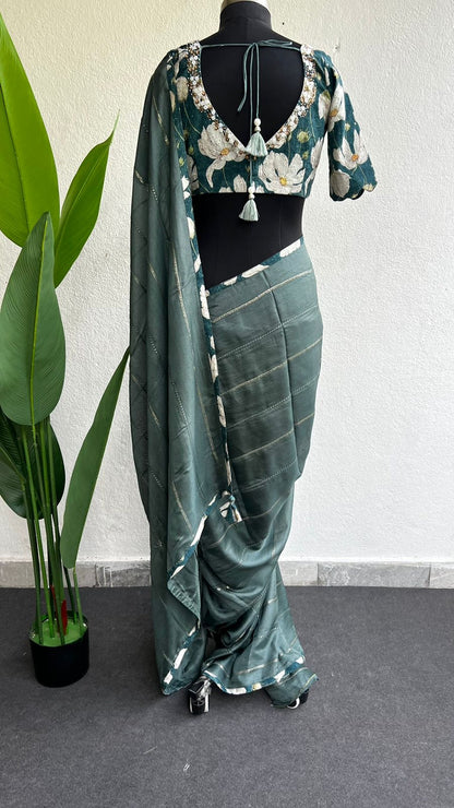 Teal green jute saree with hakoba hand worked blouse