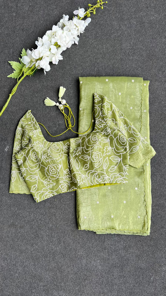 Green silk tissue saree with embroidered blouse