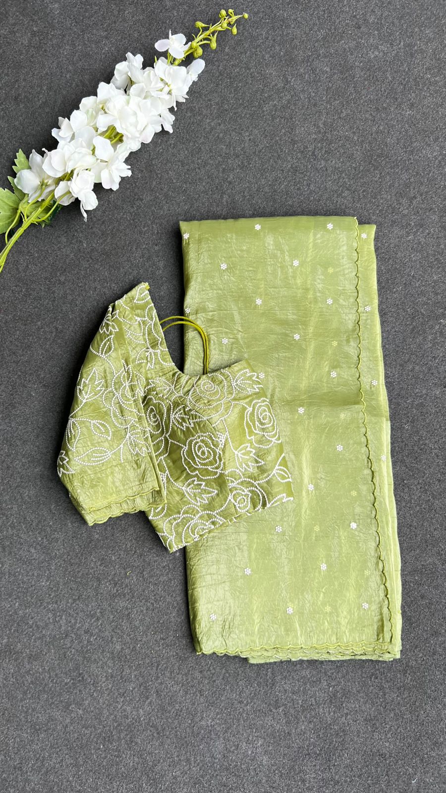 Green silk tissue saree with embroidered blouse