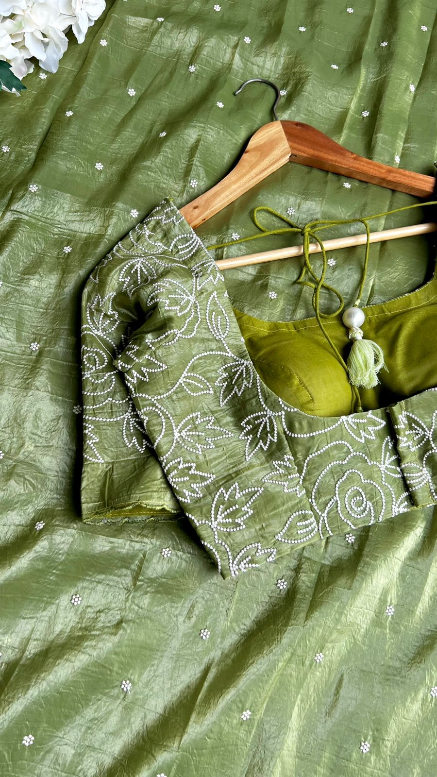 Green silk tissue saree with embroidered blouse